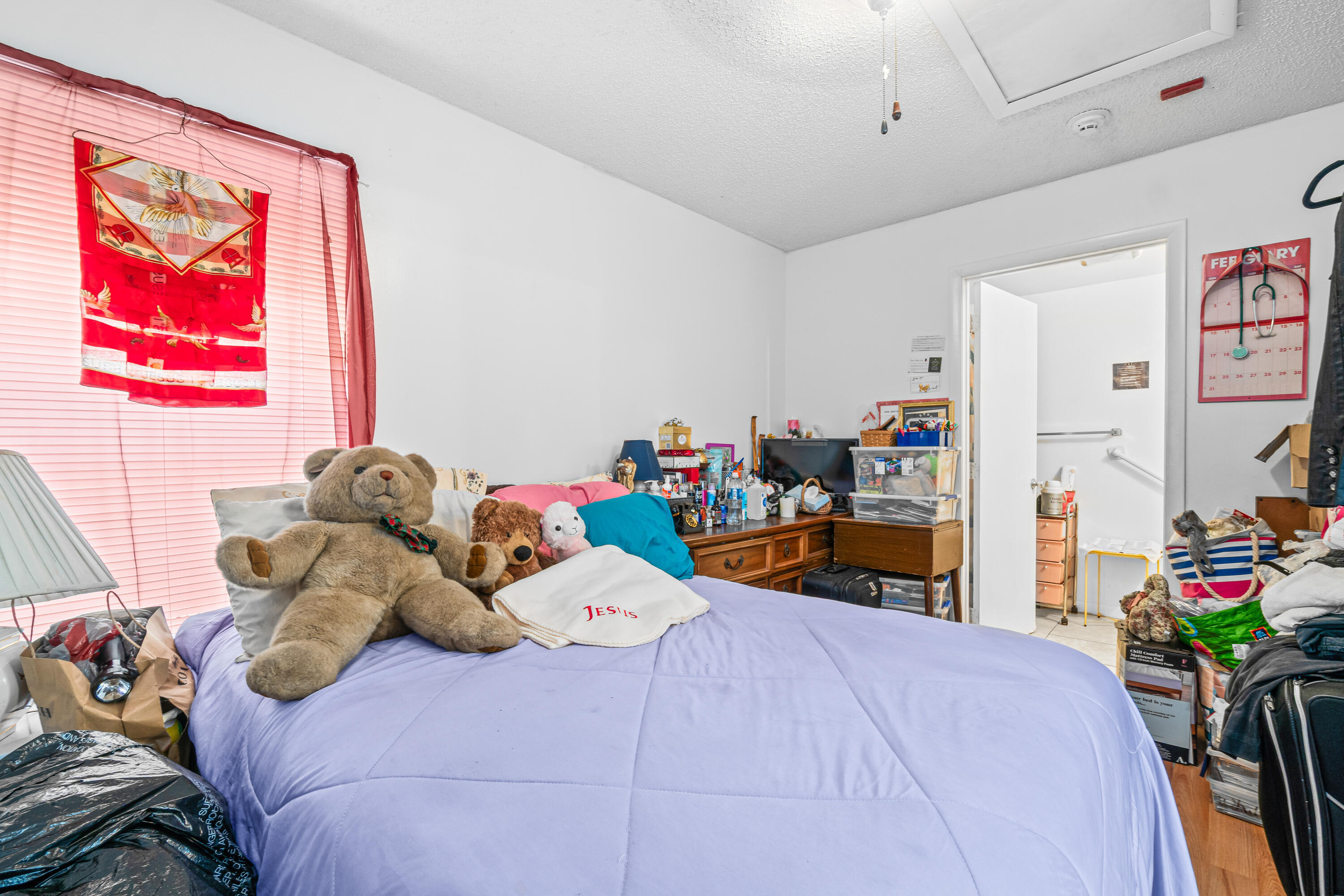 2313 Z Terrace Riviera Beach, FL 33404 - Photo 12 of 21 a bedroom with bed and a large window