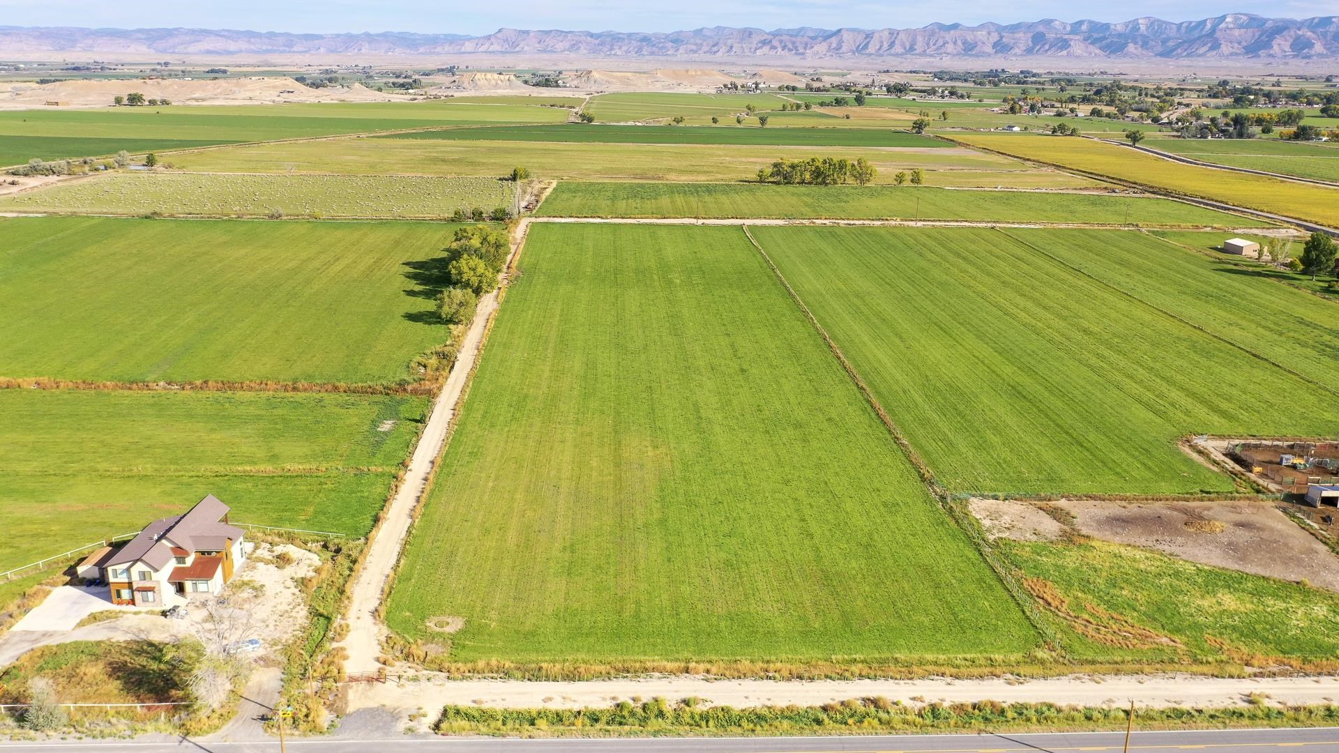 1654 M Road Fruita, CO 81521 - Photo 3 of 9 a view of a swimming pool and an ocean view