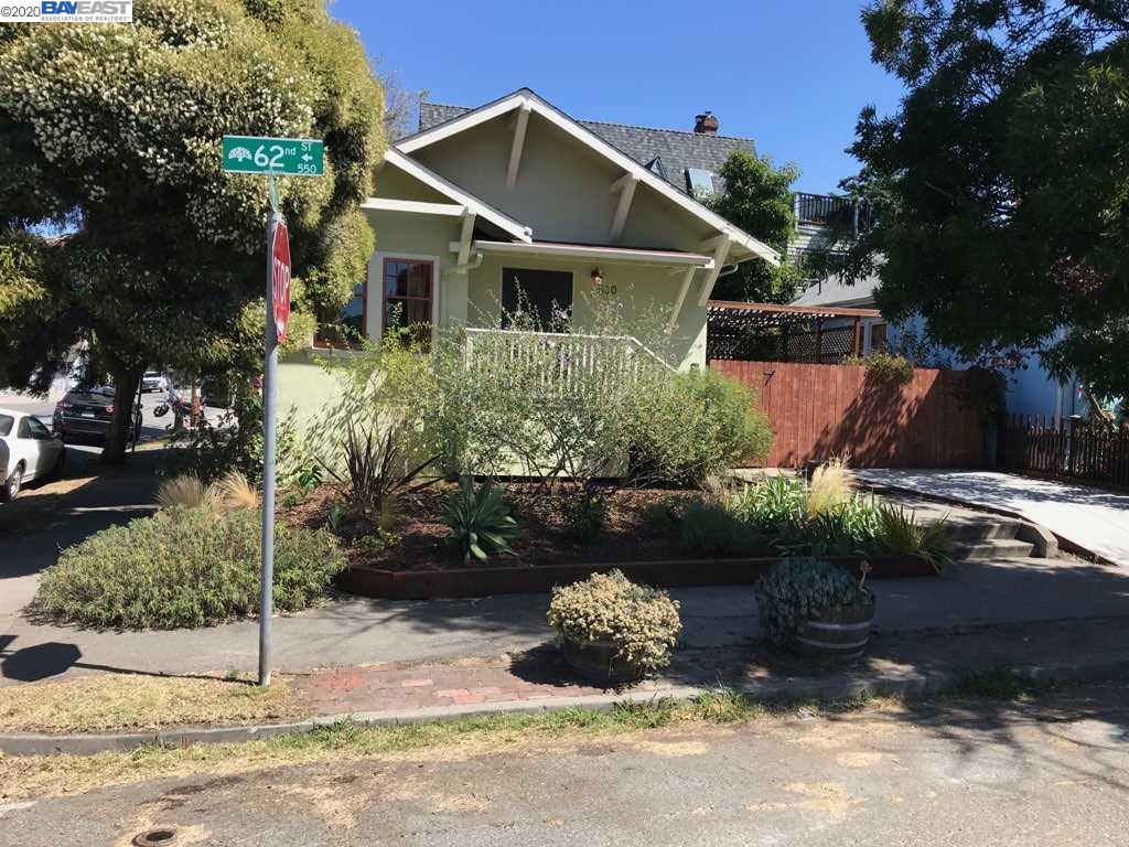 530 62nd Street Oakland, CA 94609 - Photo 1 of 1 a front view of a house with a yard and tree