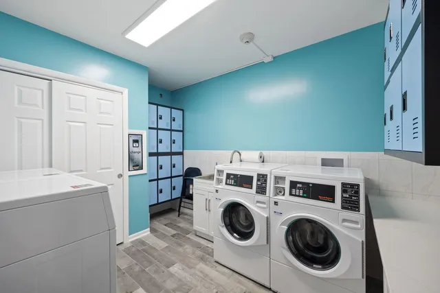 a utility room with dryer and washer