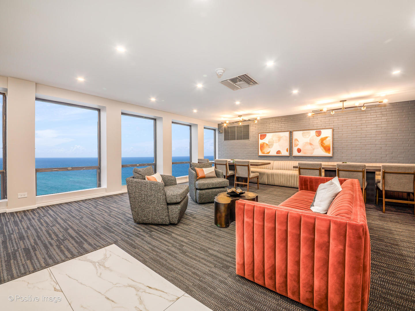 260 East Chestnut Street, Unit 2507 Chicago, IL 60611 - Photo 21 of 22 a living room with furniture kitchen view and a wooden floor
