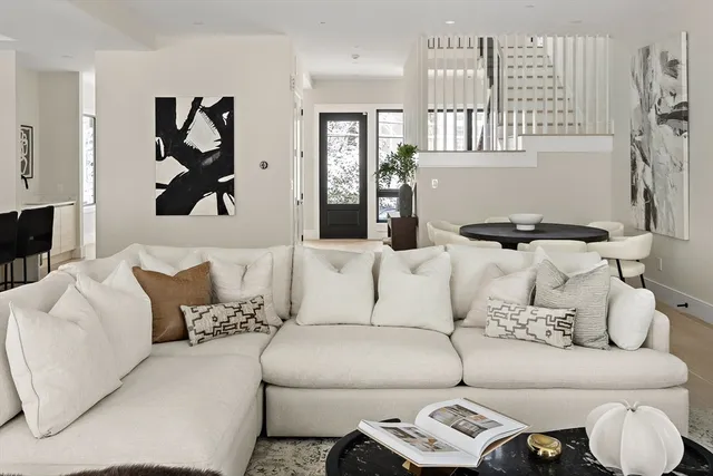 a living room with furniture and a couch