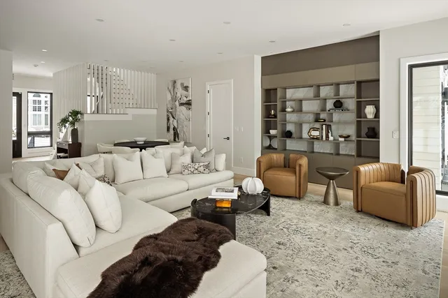 a living room with furniture or couch and a window