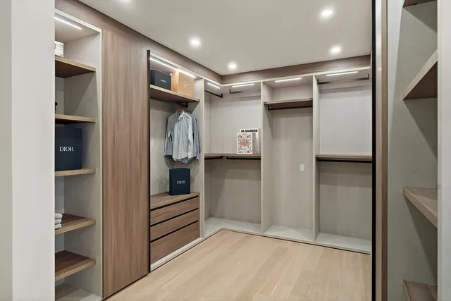 a room with a table and a mirror