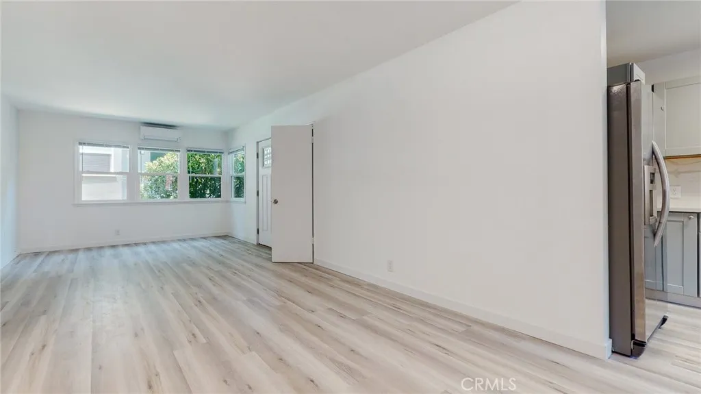239 3rd Avenue Venice, CA 90291 - Photo 4 of 24 wooden floor in an empty room with a window