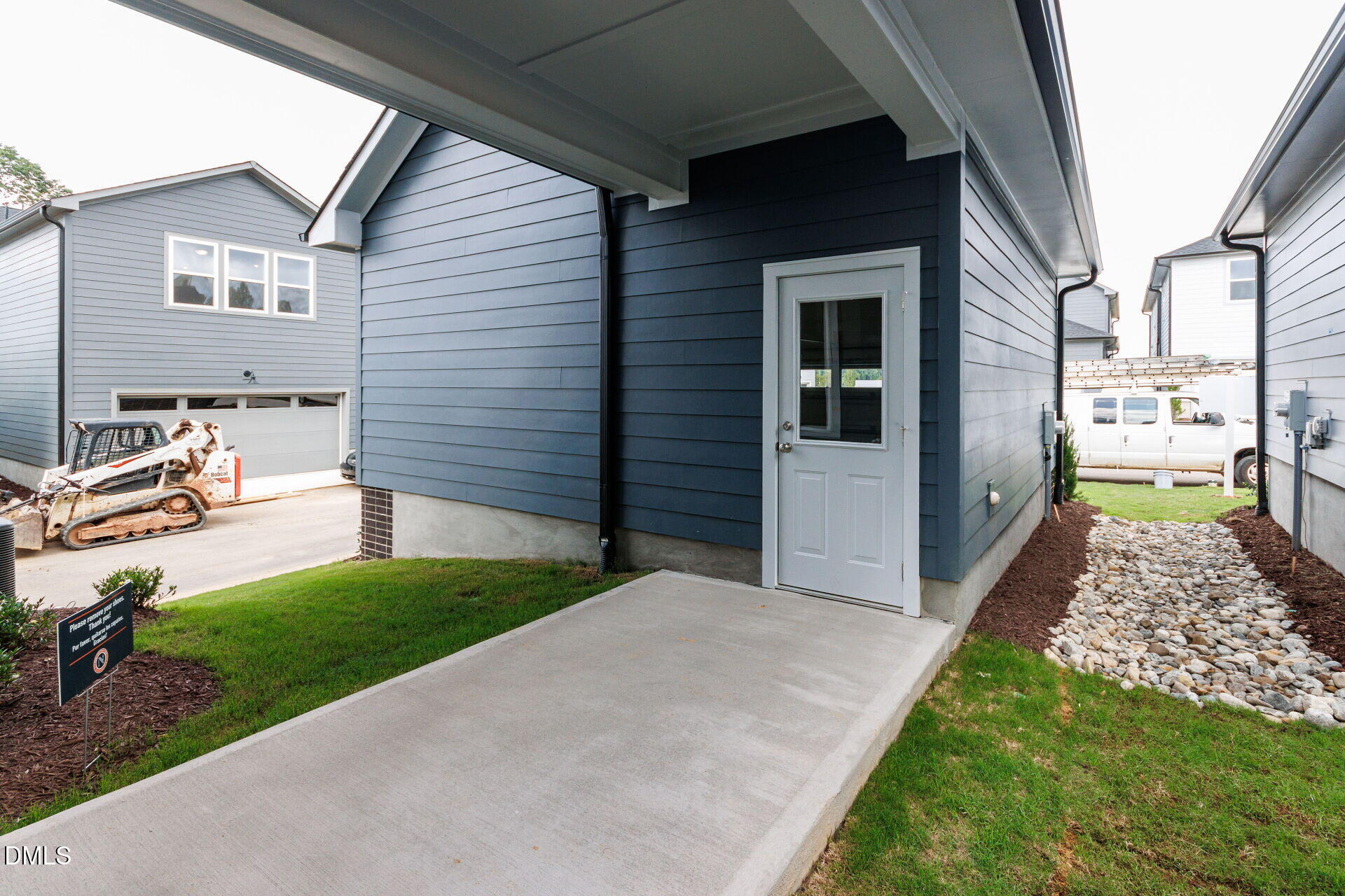 44 Relaxing Way Pittsboro, NC 27312 - Photo 18 of 19 a backyard of a house with yard and outdoor seating