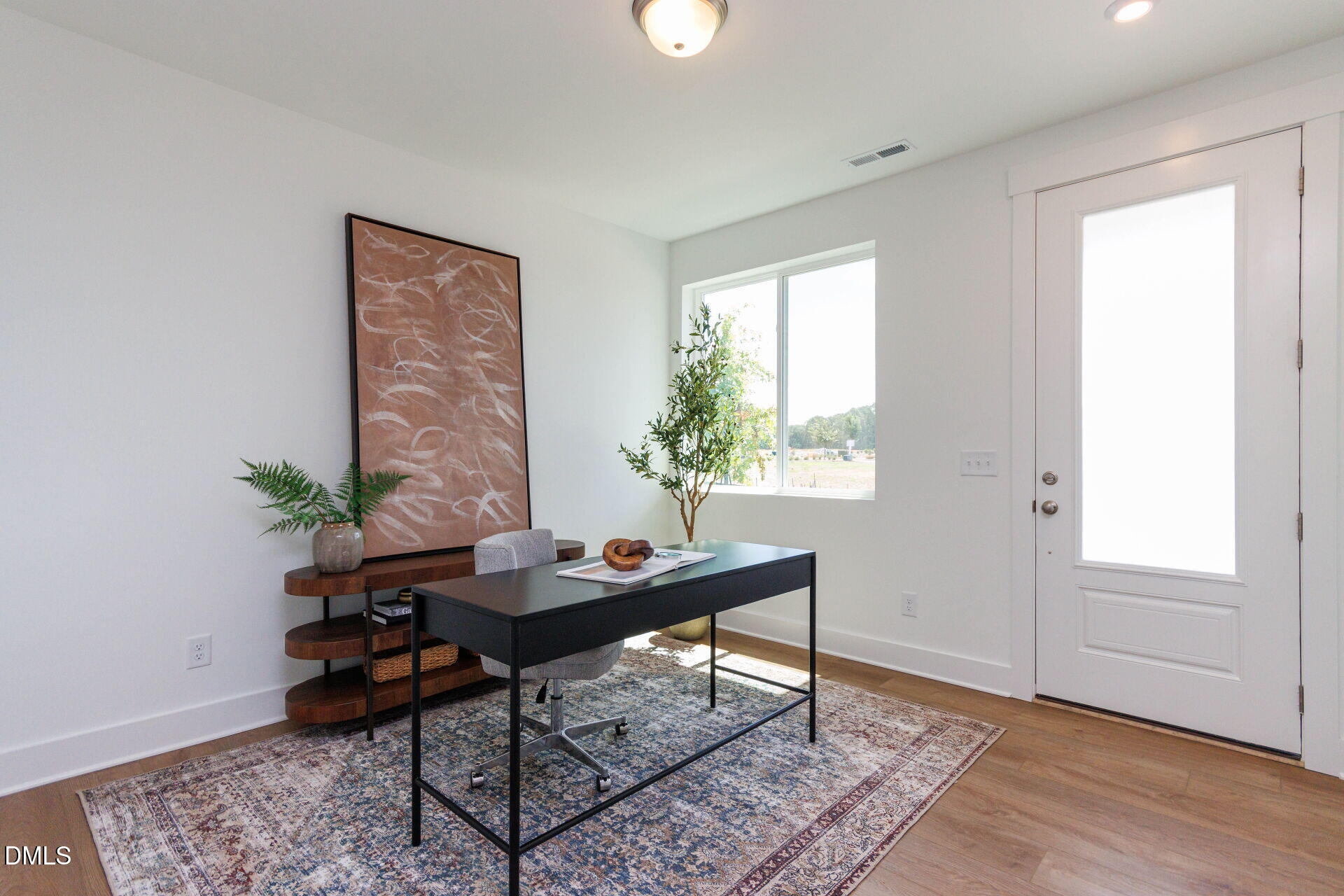 44 Relaxing Way Pittsboro, NC 27312 - Photo 3 of 19 a view of a workspace with furniture and a window