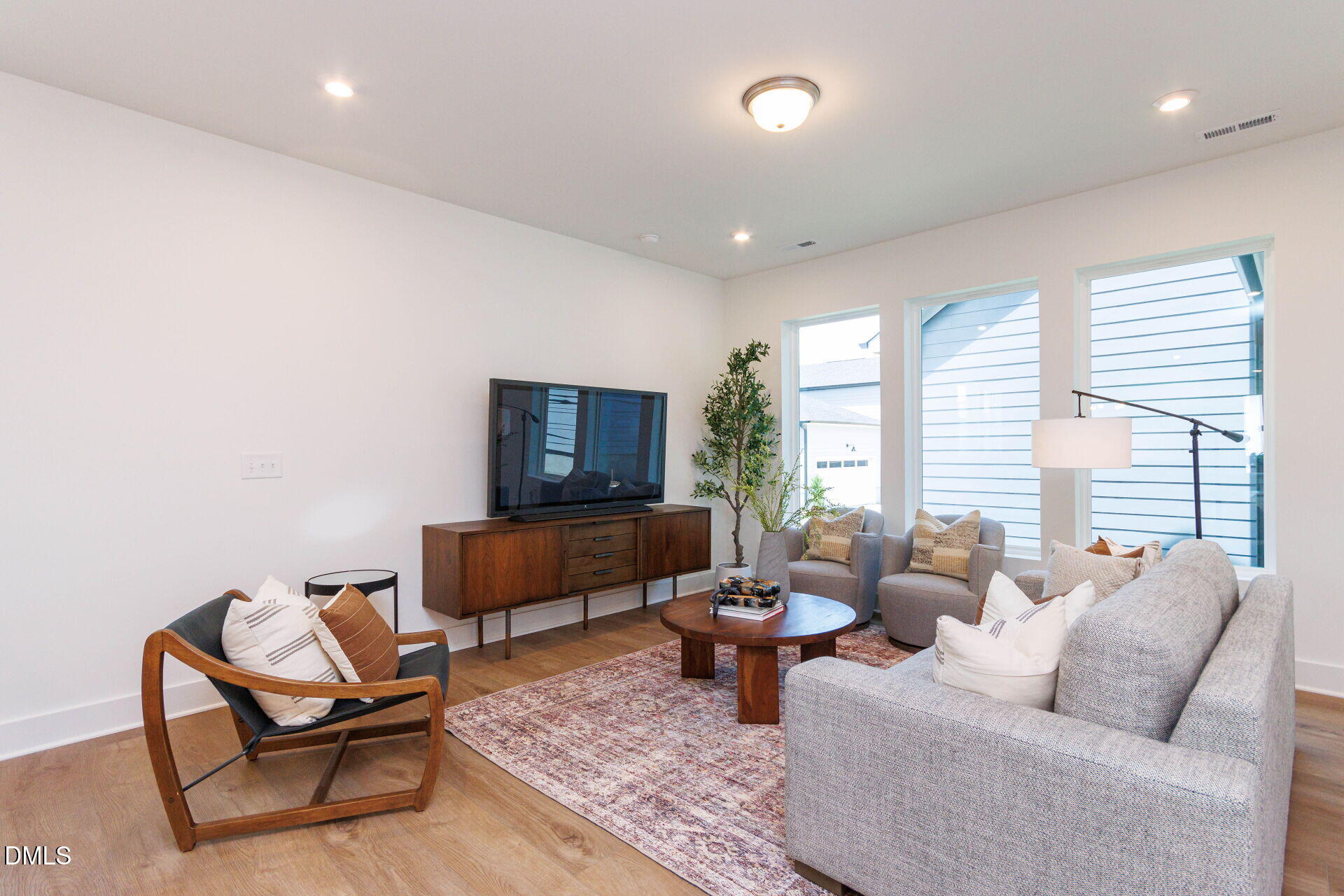 44 Relaxing Way Pittsboro, NC 27312 - Photo 9 of 19 a living room with furniture and a flat screen tv