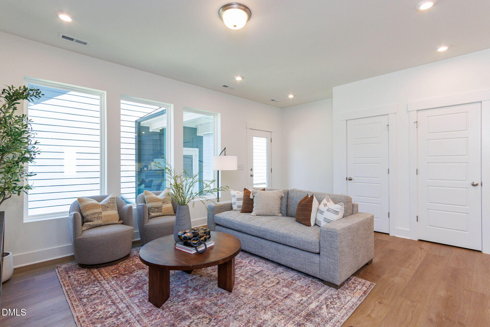 44 Relaxing Way Pittsboro, NC 27312 - Photo 10 of 19 a living room with furniture and a potted plant
