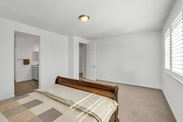 a bathroom with a sink double vanity and a mirror