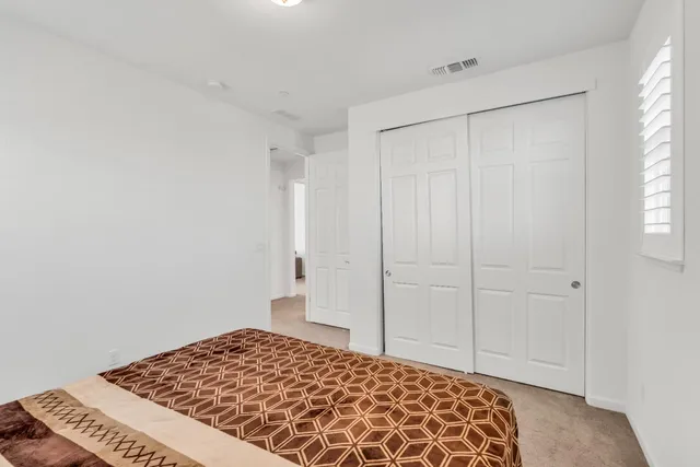 a bathroom with a sink and cabinets