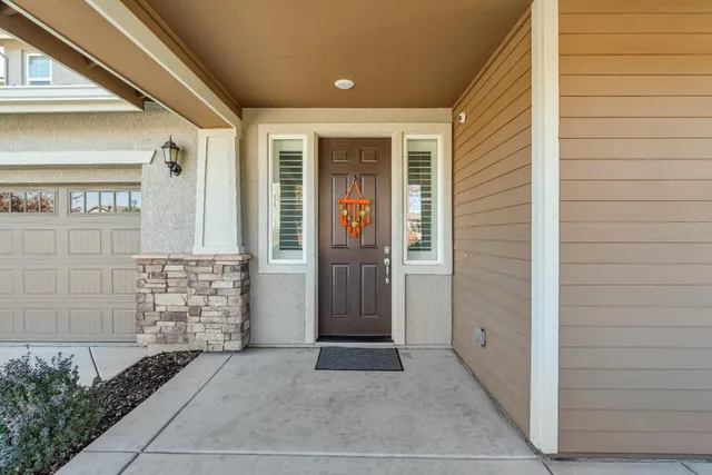 a view of a entryway door front of house