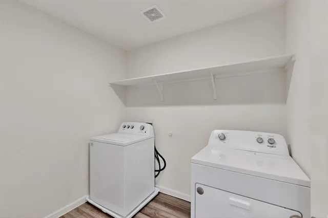 a view of a room with racks on the wall