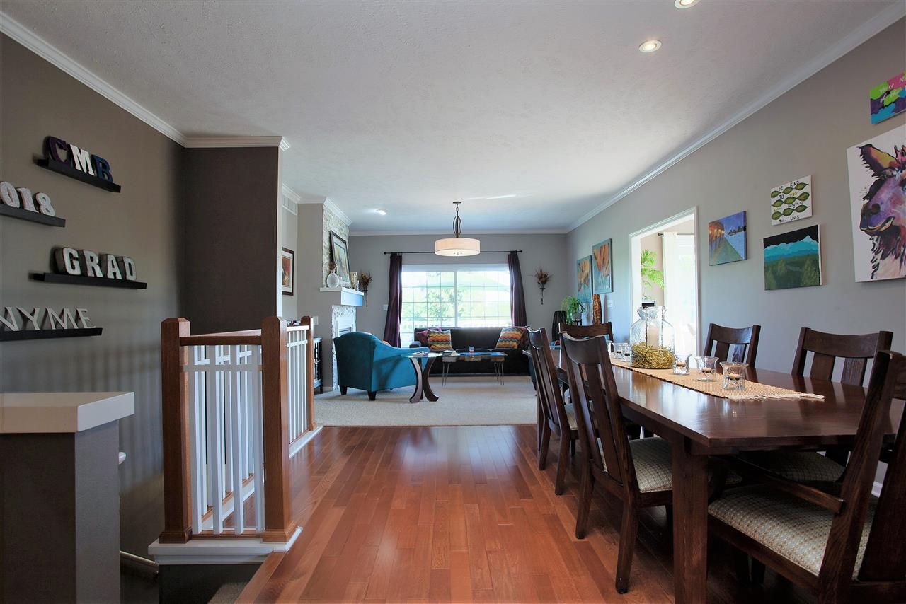 4403 Perry Ridge Lane Loves Park, IL 61111 - Photo 4 of 25 a view of a dining room with furniture window and wooden floor