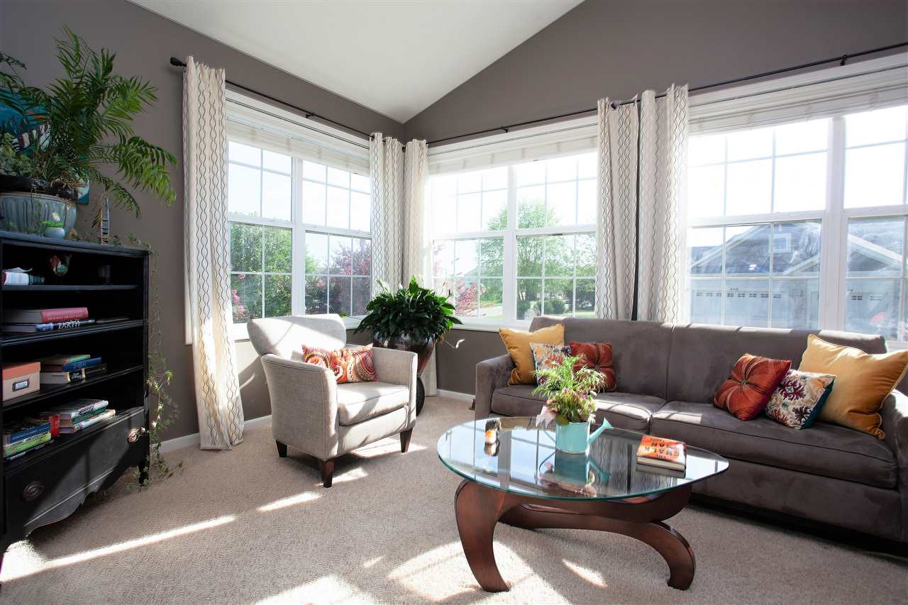 4403 Perry Ridge Lane Loves Park, IL 61111 - Photo 9 of 25 a living room with furniture and a window