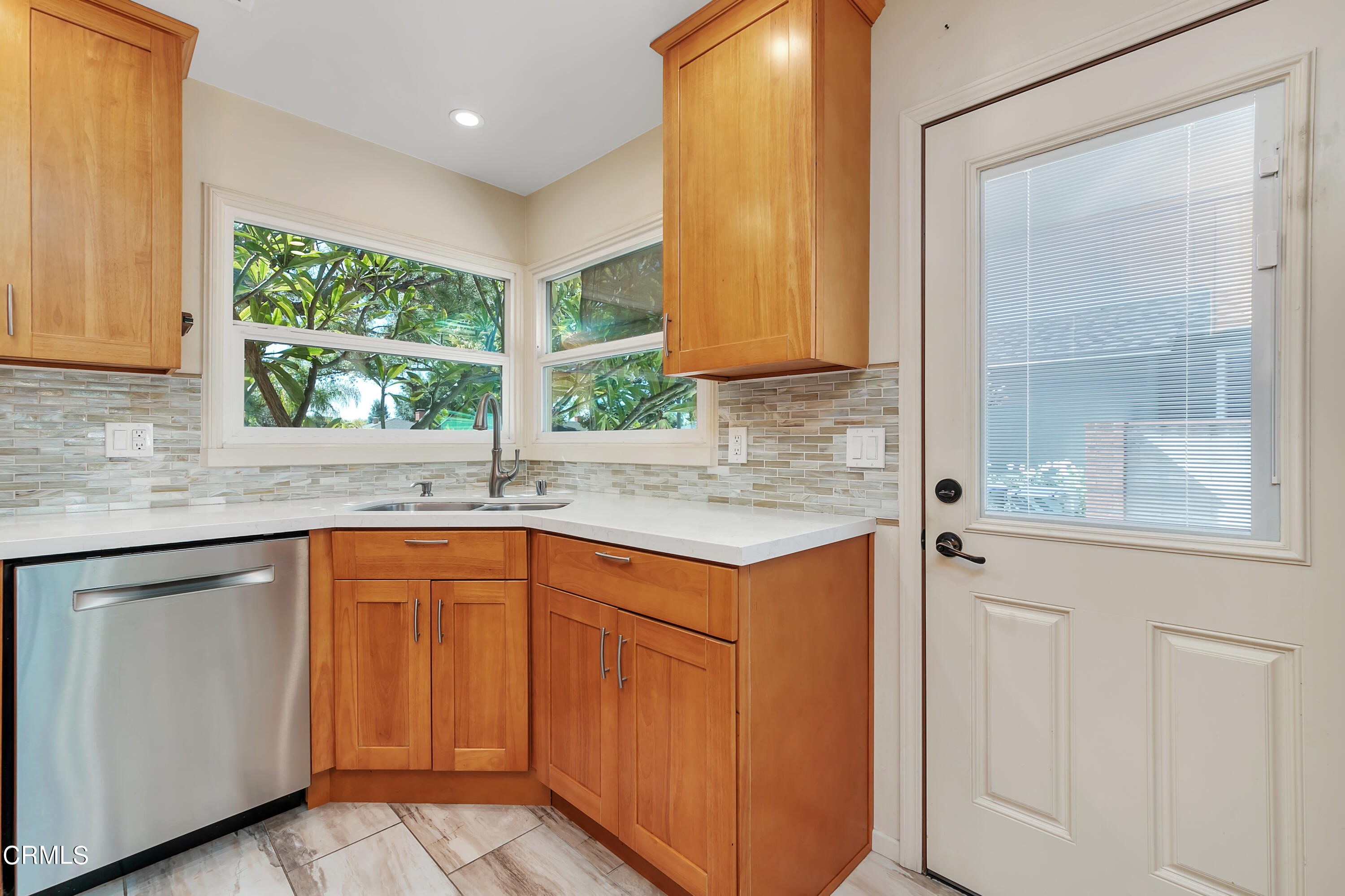 3755 Mayfair Drive Pasadena, CA 91107 - Photo 15 of 37 a kitchen with stainless steel appliances granite countertop a sink and a cabinets
