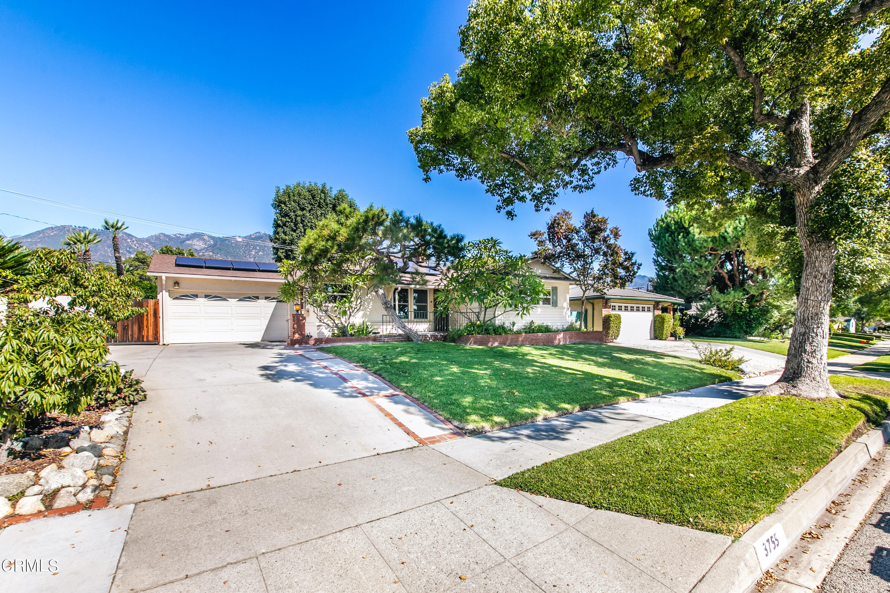 3755 Mayfair Drive Pasadena, CA 91107 - Photo 2 of 37 a front view of a house with a yard