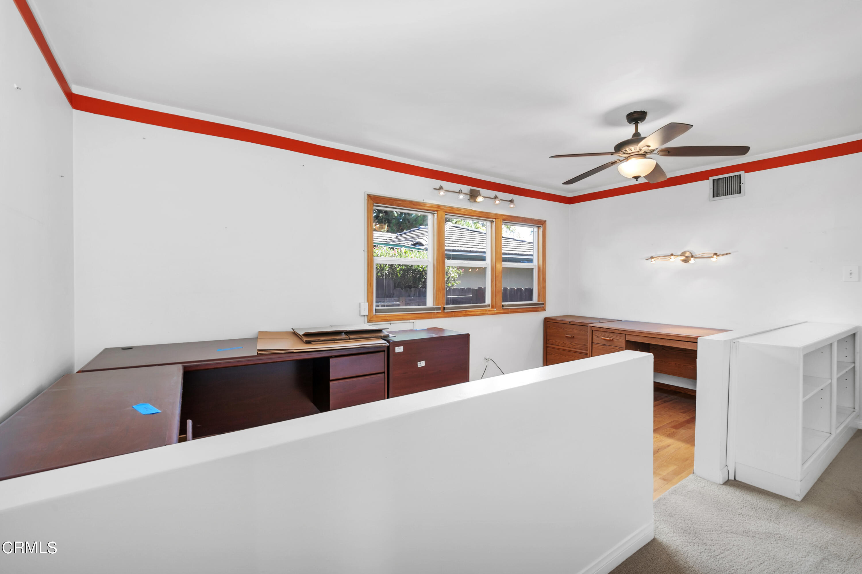 3755 Mayfair Drive Pasadena, CA 91107 - Photo 21 of 37 a living room with stainless steel appliances kitchen island granite countertop furniture and a fireplace