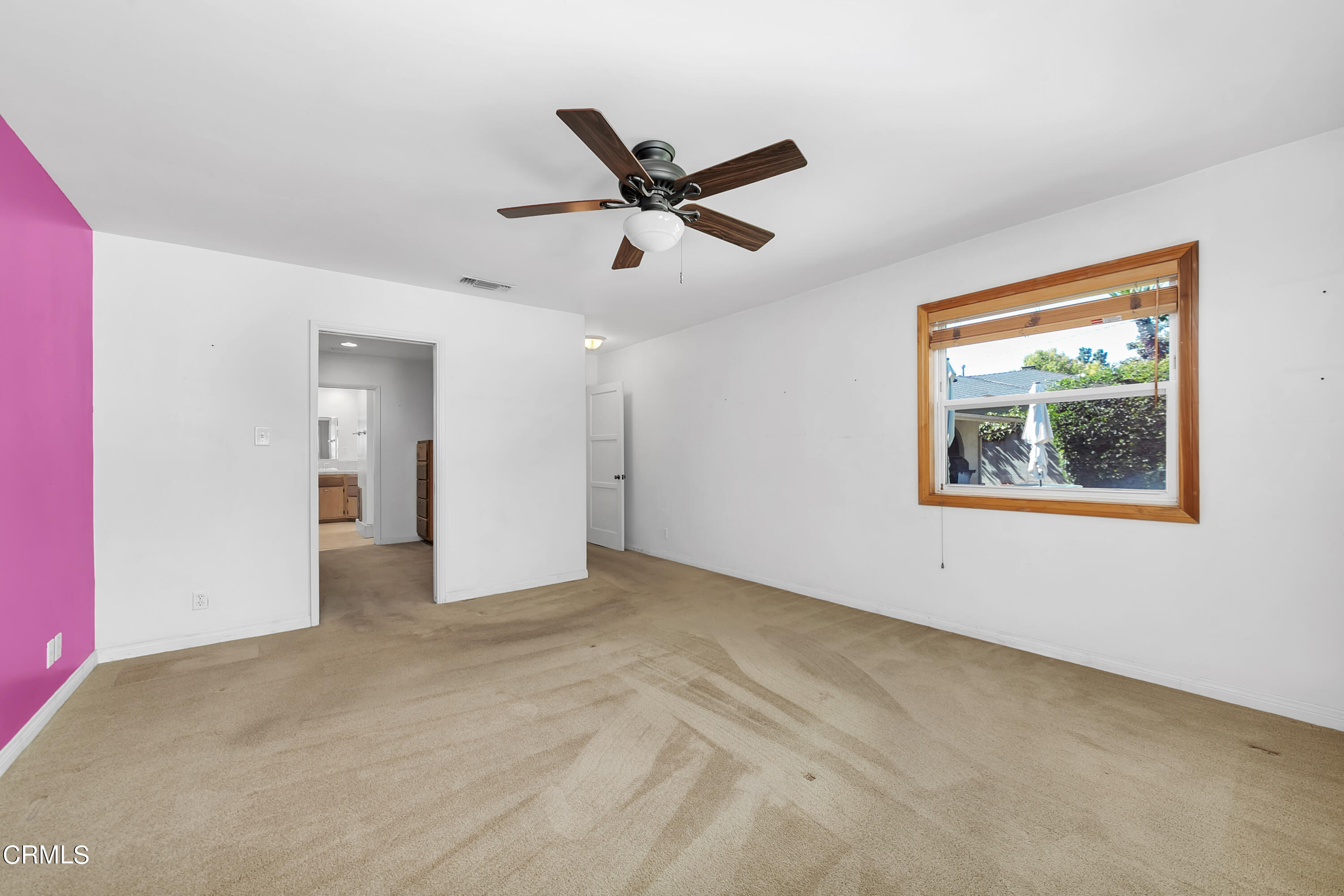 3755 Mayfair Drive Pasadena, CA 91107 - Photo 22 of 37 a view of an empty room with window and ceiling fan