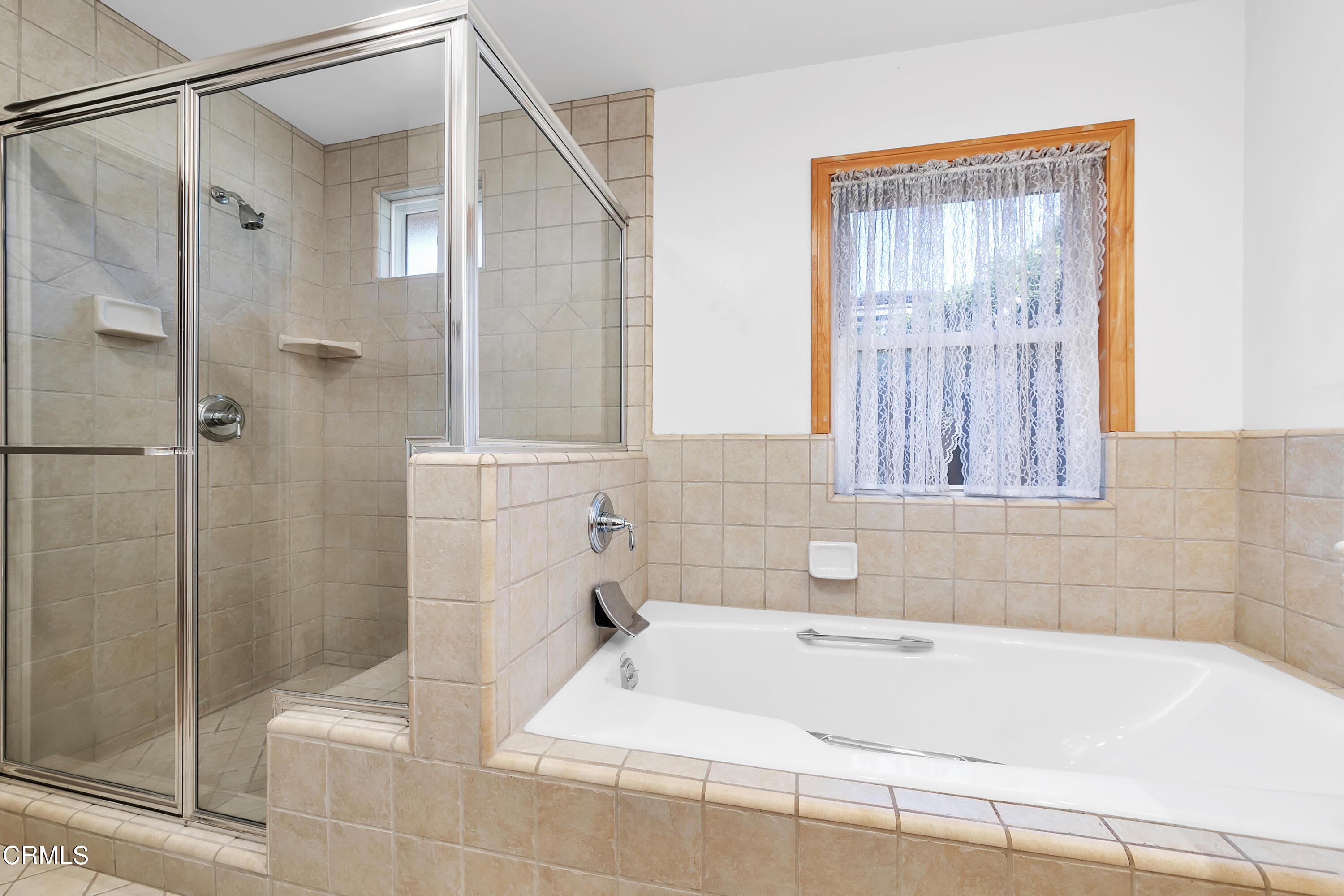 3755 Mayfair Drive Pasadena, CA 91107 - Photo 25 of 37 a bathroom with a bathtub and shower