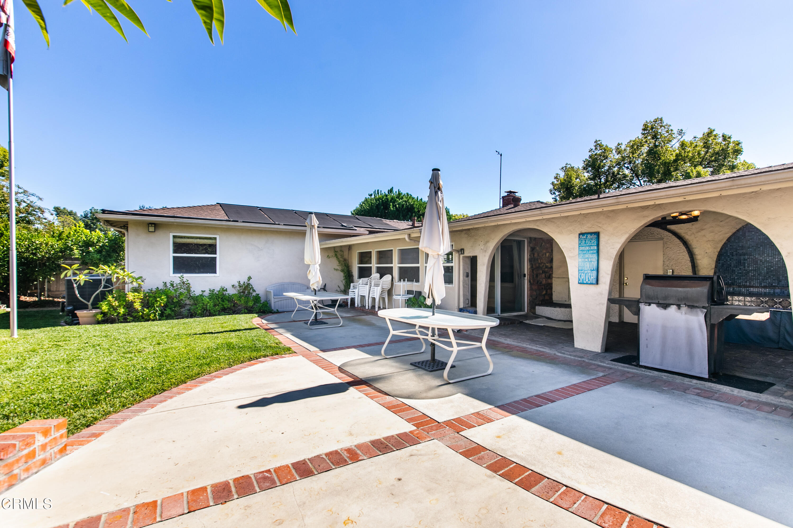3755 Mayfair Drive Pasadena, CA 91107 - Photo 29 of 37 a view of a house with backyard sitting area and garden