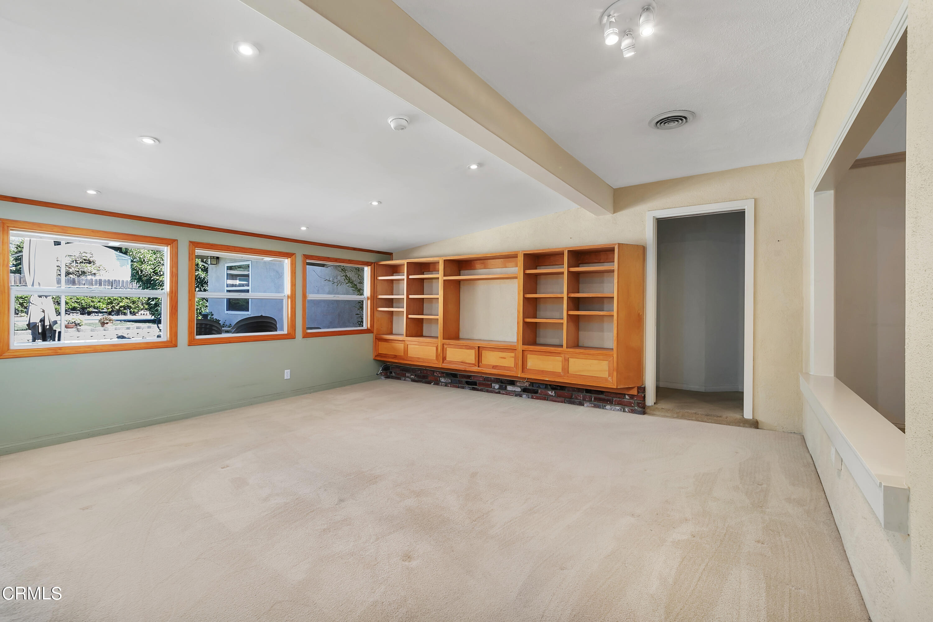 3755 Mayfair Drive Pasadena, CA 91107 - Photo 9 of 37 an empty room with wooden floor and windows