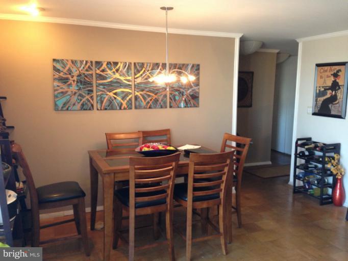3245 Rio Drive, Unit 806 Falls Church, VA 22041 - Photo 3 of 5 a view of a dining room with furniture