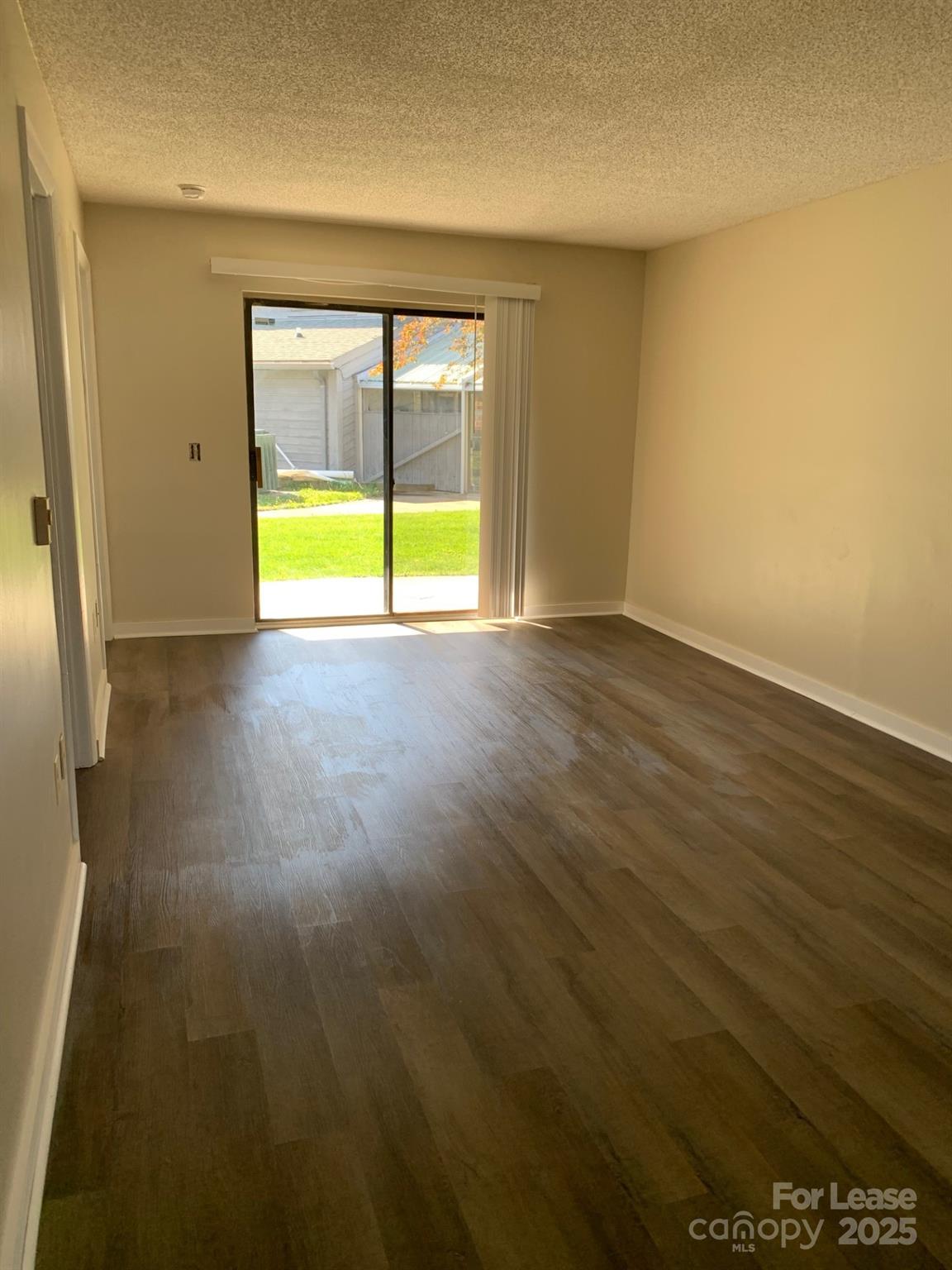 128 Zeb Street, Unit C101 Boone, NC 28607 - Photo 5 of 17 an empty room with a natural light