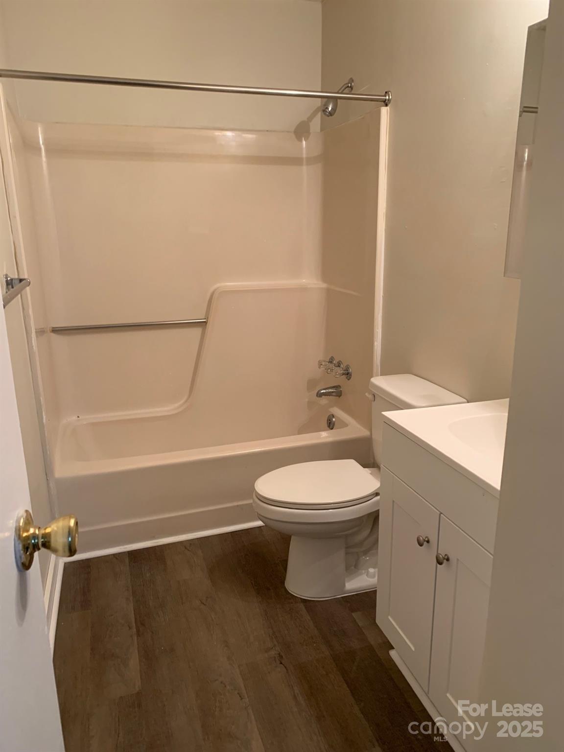 128 Zeb Street, Unit C101 Boone, NC 28607 - Photo 10 of 17 a bathroom with a toilet a sink and shower