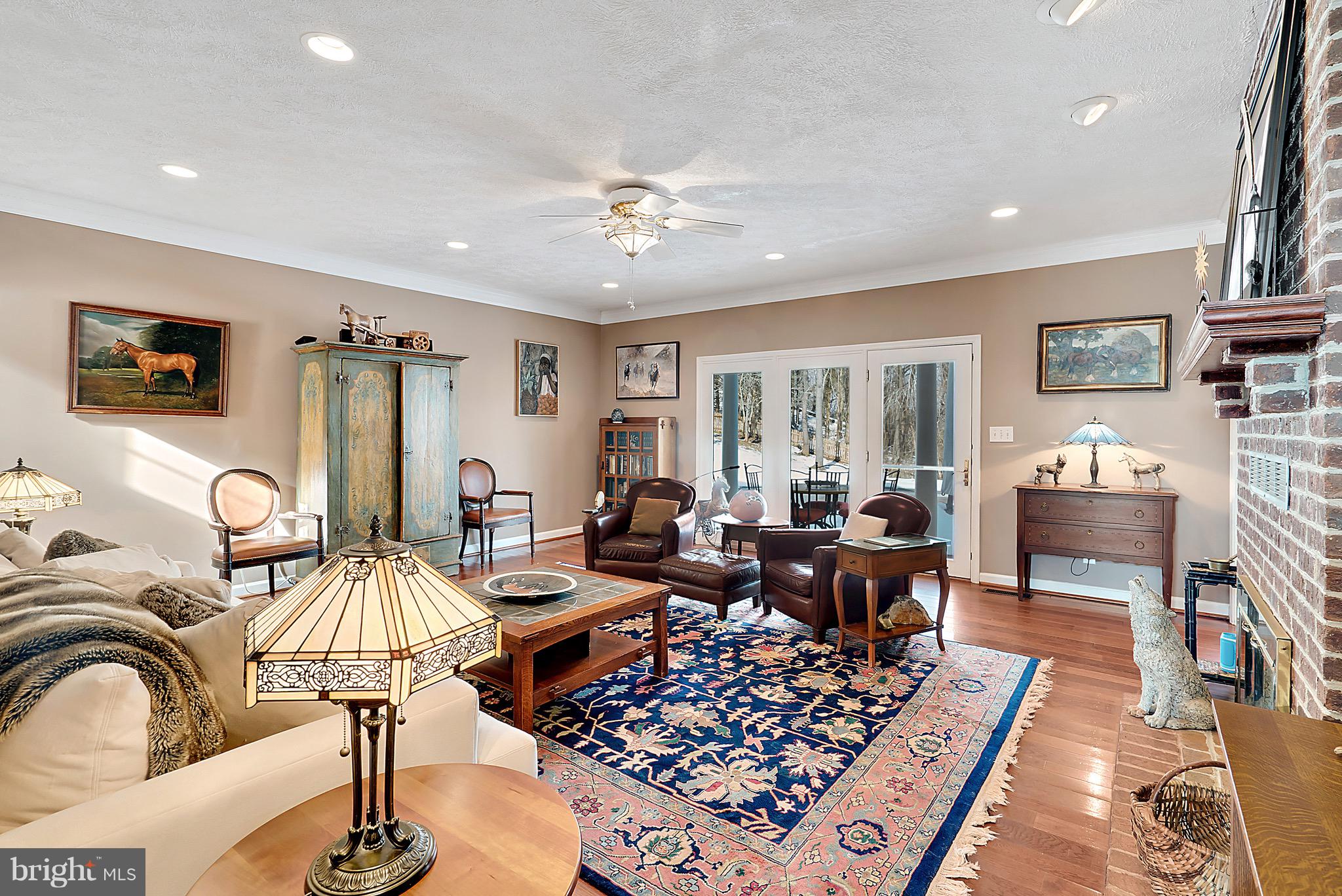 15325 Old Barn Road Rixeyville, VA 22737 - Photo 2 of 58 Living room with fireplace and pationdoors