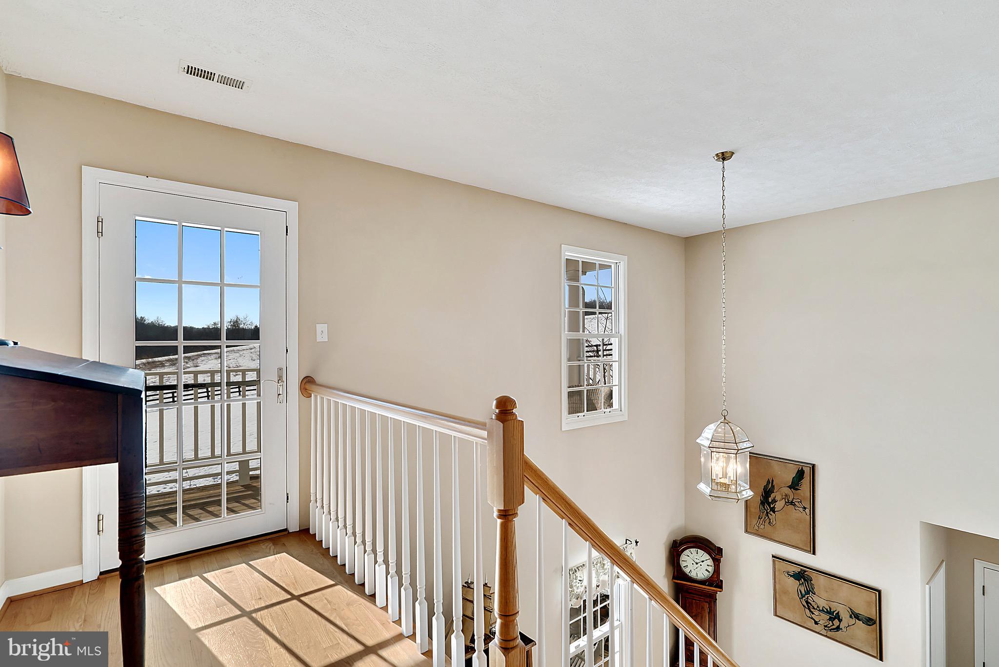 15325 Old Barn Road Rixeyville, VA 22737 - Photo 36 of 58 Upstairs Landing w/Exterior Door to Front Balcony