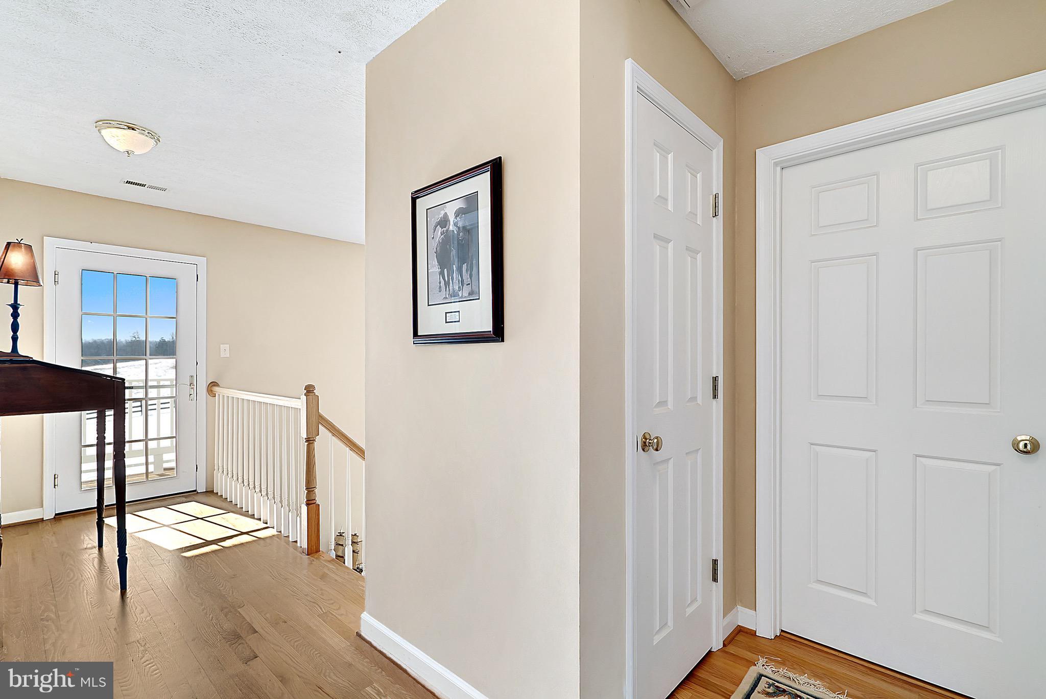 15325 Old Barn Road Rixeyville, VA 22737 - Photo 37 of 58 Upstairs hall w/door to front balcony