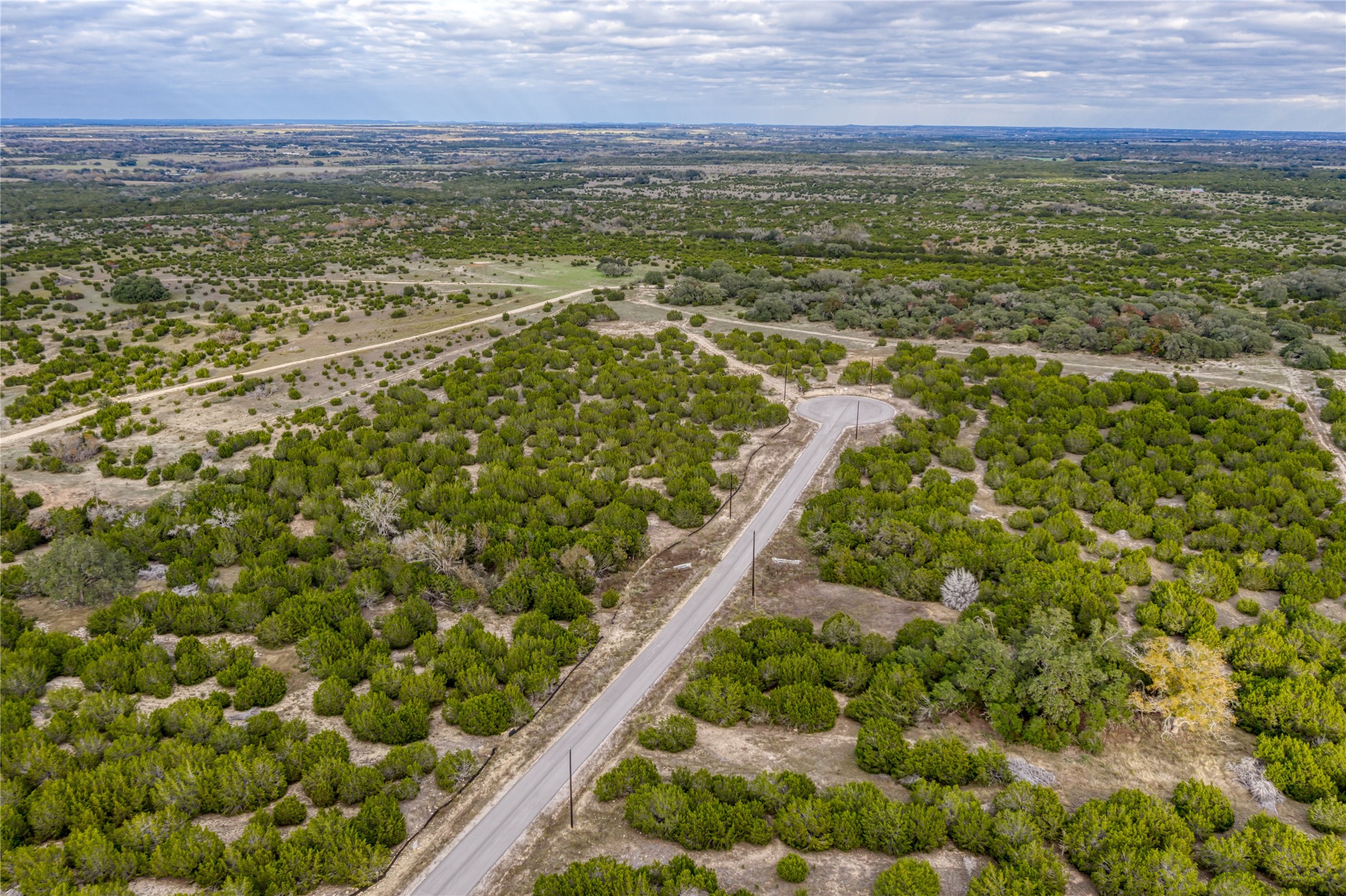 178 Whispering Wind Road Bertram, TX 78605 - Photo 8 of 16 Photos of Whispering Wind development. May not be of actual lot.