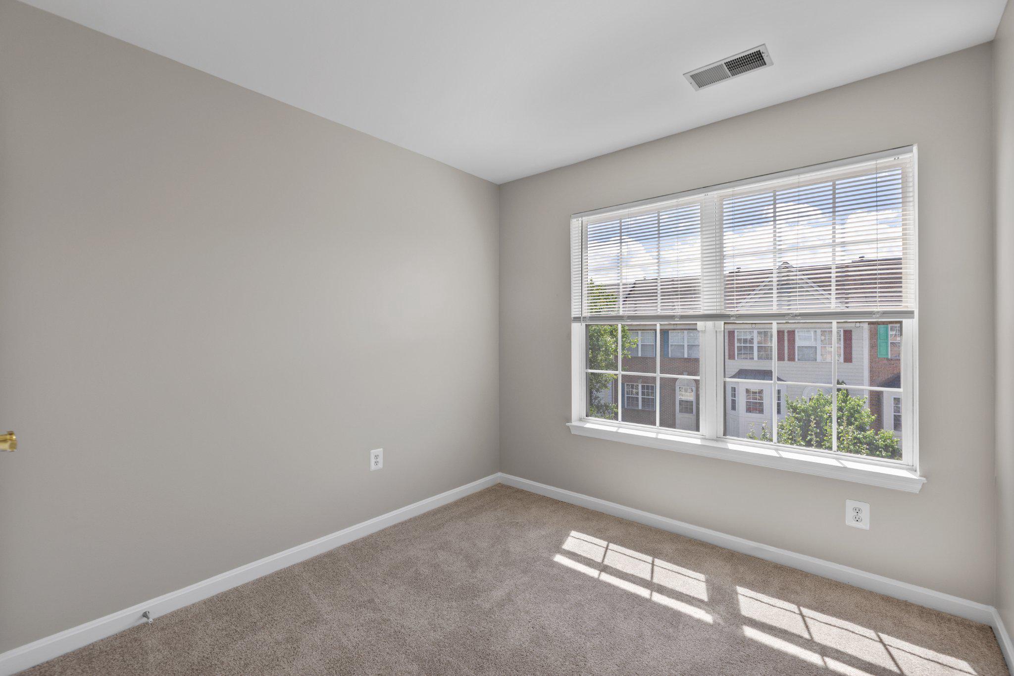9241 Lorton Valley Road Lorton, VA 22079 - Photo 32 of 45 Bedroom 3 with natural light and new carpet.