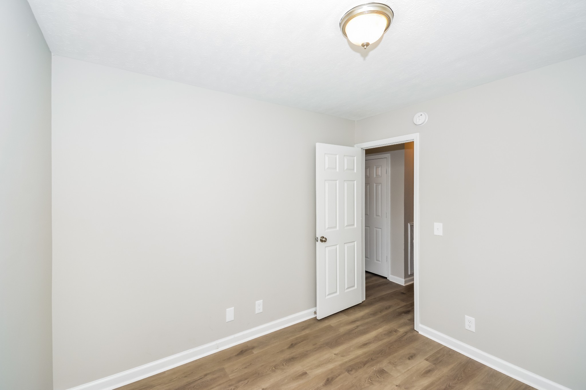 2607 Landrum Court, Unit 8 Springfield, TN 37172 - Photo 11 of 17 a view of a room with wooden floor
