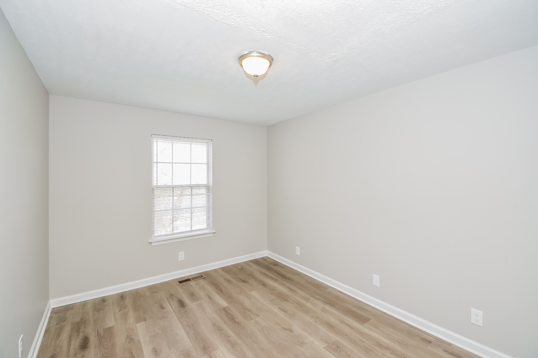 2607 Landrum Court, Unit 8 Springfield, TN 37172 - Photo 12 of 17 an empty room with a window