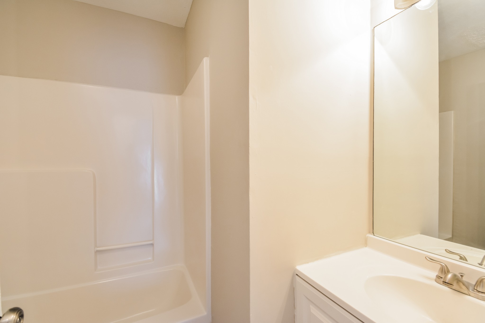 2607 Landrum Court, Unit 8 Springfield, TN 37172 - Photo 14 of 17 a bathroom with a sink and a bathtub