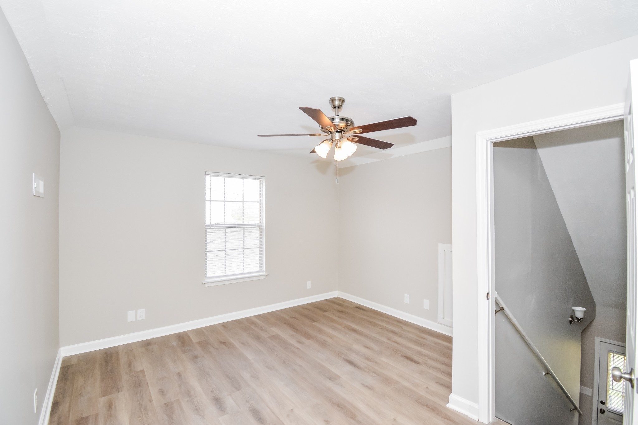 2607 Landrum Court, Unit 8 Springfield, TN 37172 - Photo 6 of 17 a view of a big room with wooden floor and windows
