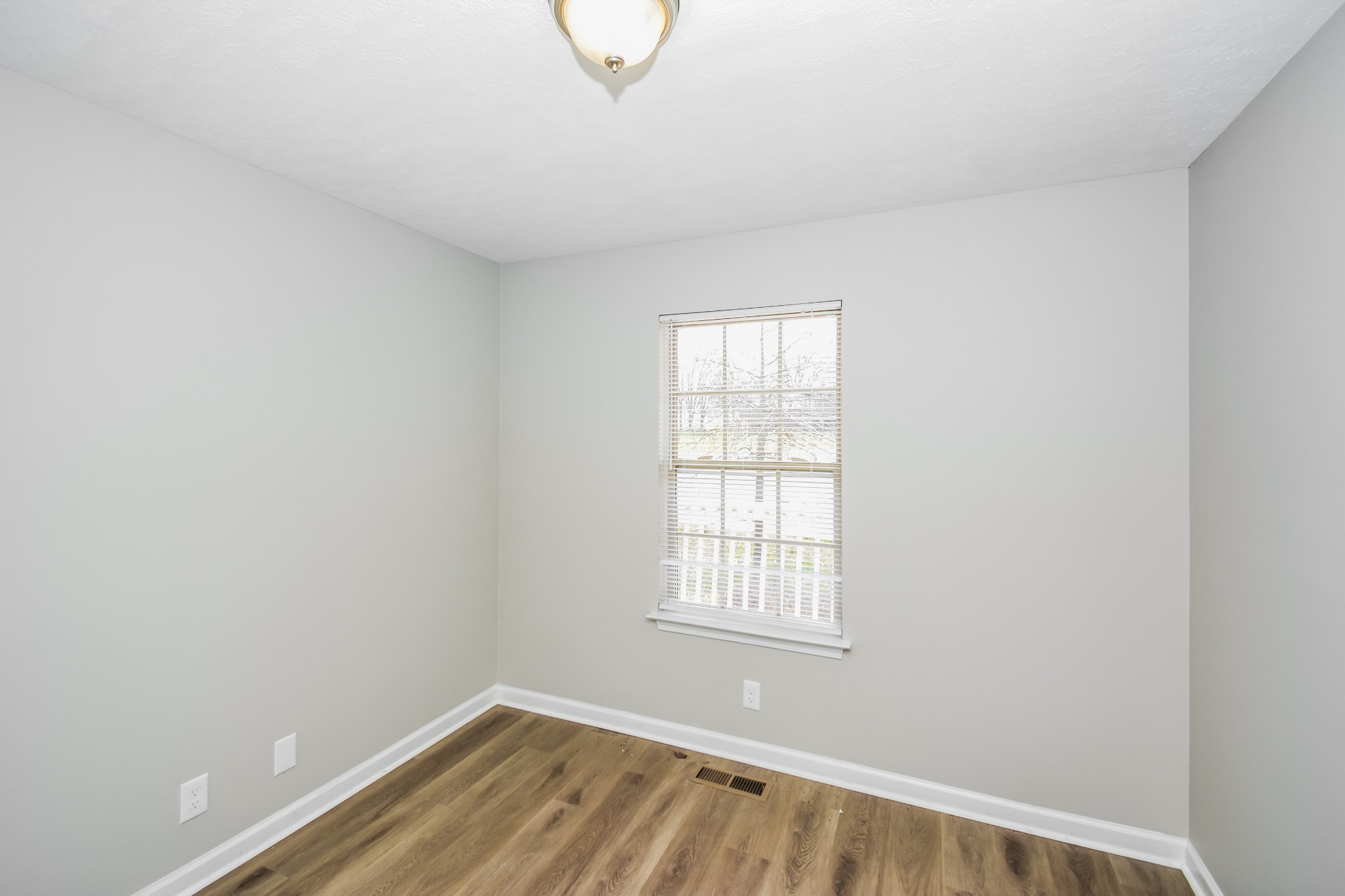 2607 Landrum Court, Unit 8 Springfield, TN 37172 - Photo 10 of 17 an empty room with a window