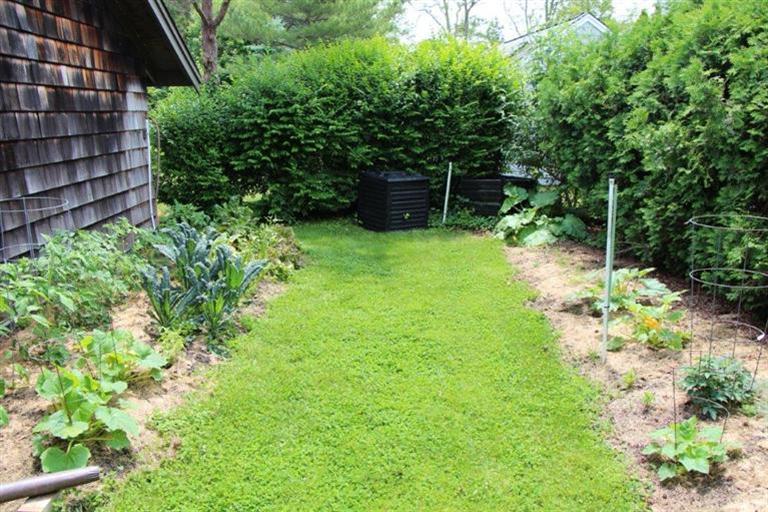 137 Jefferson Road Bourne, MA 02532 - Photo 14 of 28 a backyard of a house with lots of green space