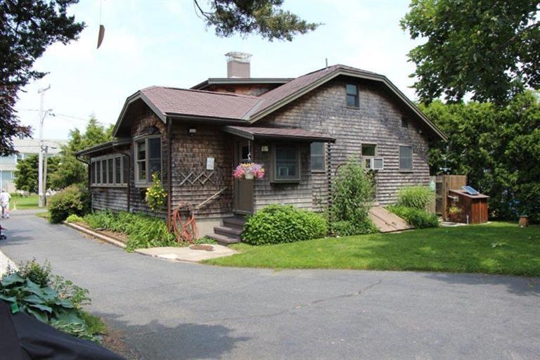 137 Jefferson Road Bourne, MA 02532 - Photo 16 of 28 a front view of house with yard and green space