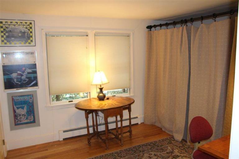 137 Jefferson Road Bourne, MA 02532 - Photo 19 of 28 a view of a room with a table and chairs