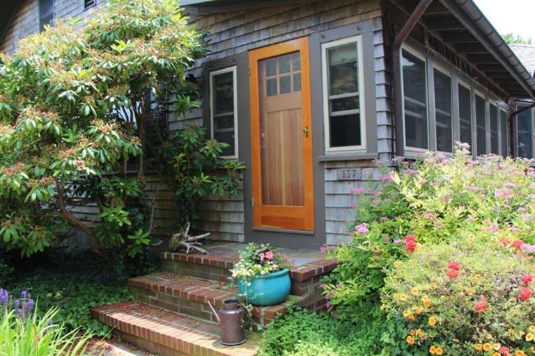137 Jefferson Road Bourne, MA 02532 - Photo 20 of 28 a view of a house with potted plants