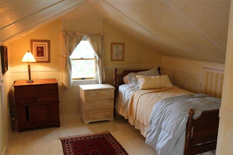 137 Jefferson Road Bourne, MA 02532 - Photo 23 of 28 a bedroom with a bed and a dresser