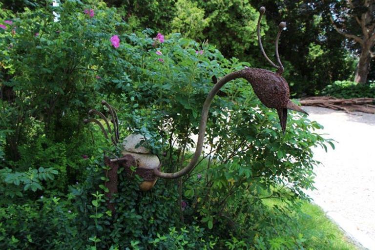 137 Jefferson Road Bourne, MA 02532 - Photo 28 of 28 a backyard of a house with lots of green space and seating area