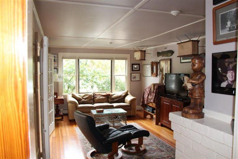 137 Jefferson Road Bourne, MA 02532 - Photo 8 of 28 a living room with furniture and a flat screen tv