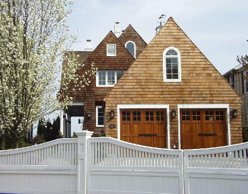 981 Fairfield Beach Road Fairfield, CT 06824 - Photo 1 of 1 a view of a brick house with large windows