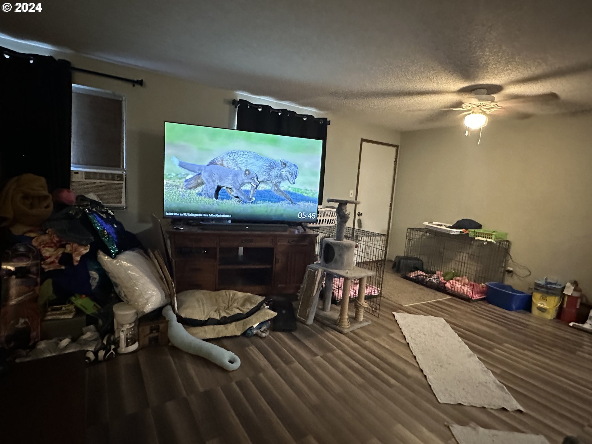 121 Copper Way Riddle, OR 97469 - Photo 7 of 21 a room with furniture and screen tv