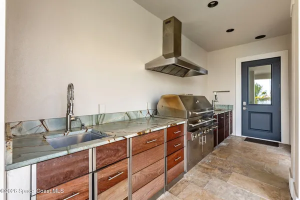 a view of a storage & utility room with a washer dryer