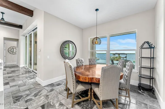 a very nice looking room with a ceiling fan